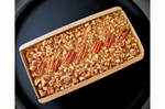 Rich and festive fruitcake packed with dates, raisins, cranberries, walnuts, praline pecans, and a hint of rum, offering a perfect blend of fruity sweetness, nutty crunch, and warm, spiced flavors
