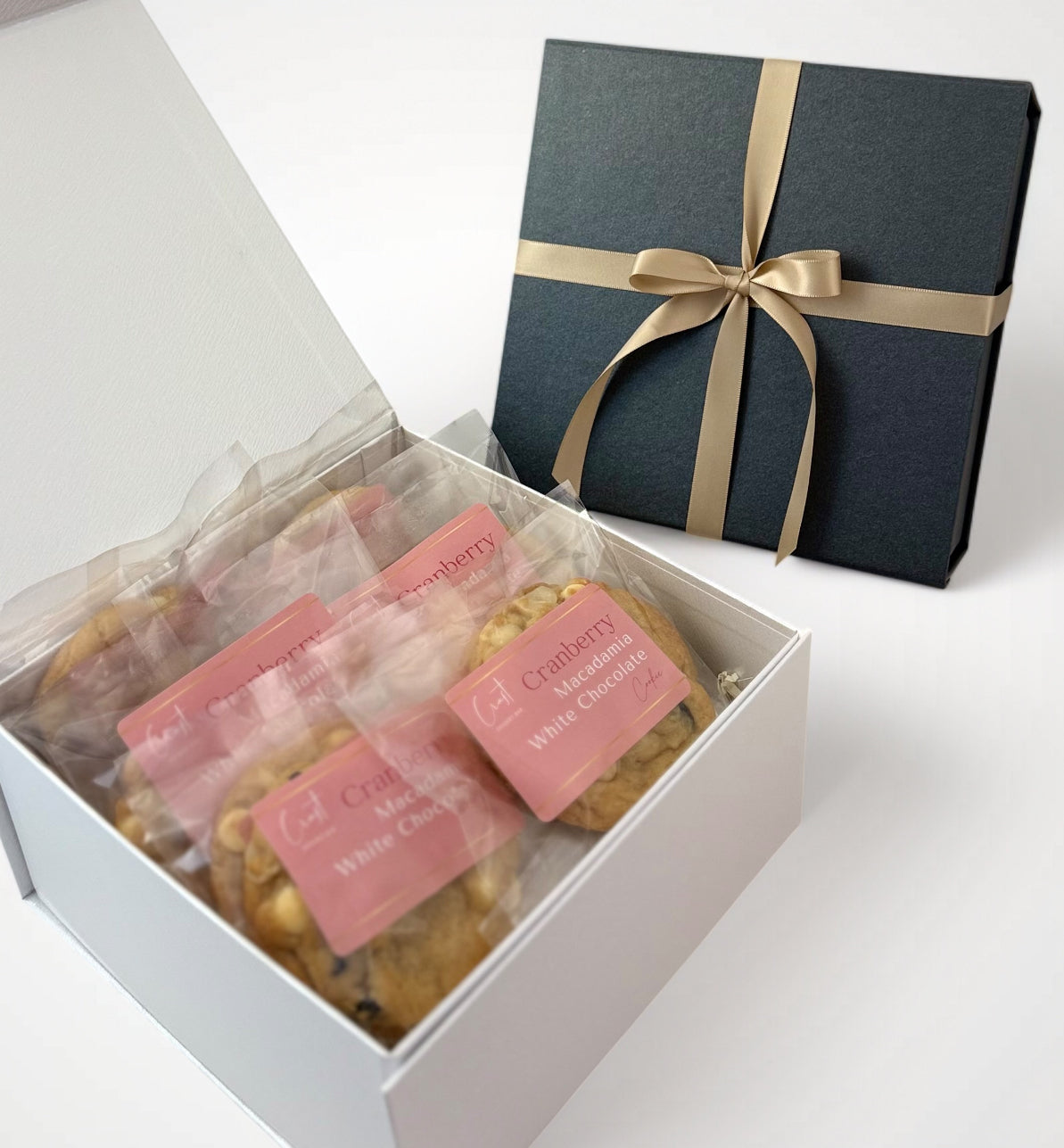 Dozen cranberry macadamia cookies with creamy white chocolate, featuring a perfect balance of tart dried cranberries, crunchy macadamia nuts, and smooth white chocolate in every bite.