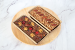 Fruitcake with pecans, walnuts, cranberries, cherries, dates, praline pecans. Rum infused fruitcake. Fruitcake with rum.