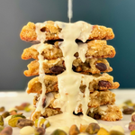 Elegant pistachio cookies with luscious Belgian white chocolate, blending nutty crunch with smooth, creamy sweetness for a truly indulgent treat