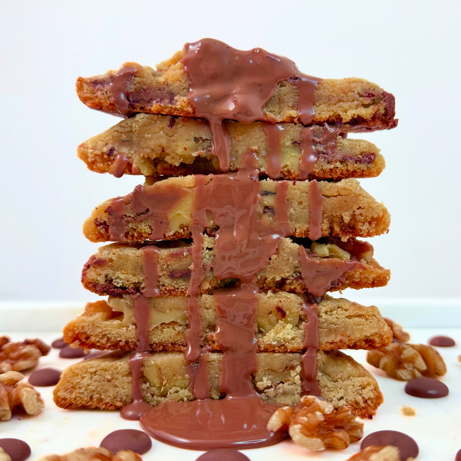 Delicious walnut cookies paired with rich Belgian milk chocolate, offering a perfect balance of crunchy walnuts and smooth, creamy chocolate for a truly indulgent experience
